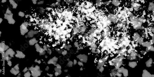 Snowflakes on dark background. white icy snowflakes isolated on black background, natural background. white crystalline powder on a black background. sugar dust. texture, pattern and clipping.