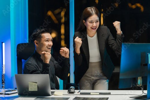 Photos Successful Business Team Celebrating at Night