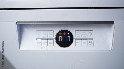 close up of dishwasher indicator