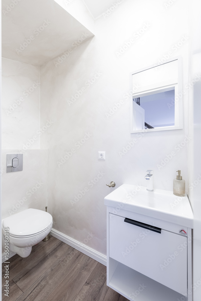 Bright Elegant Modern Luxury Scandinavian Bathroom Interior Design of Bathroom. LED Lights. WC, White Sink. Soap Bottle Bright Elegant Modern Luxury Scandinavian Bathroom Interior Design of Bathroom. LED Lights. WC, White Sink. Soap Bottle