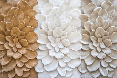 Close-up of 3D Floral Relief on a Textured Wall