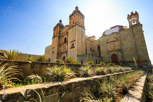 Oaxaca de Juárez, Mexico, features colonial buildings,, the central square, and the Government Palace, with colorful murals depicting regional history. Oaxaca Cathedral Templo de Santo Domingo church