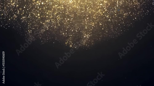 Golden shimmering particles float in darkness. Bright dust and light appear against black background. Abstract glitter overlay footage.