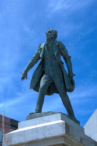historical bronze Figure of Manuel Fernandes Tomás a prominant liberal in Portugals revolution monument,  by artist António Fernandes de Sá inaugurated in August 1911