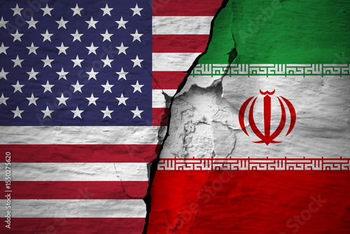 Conflict between the countries. America and Iran flags on the cracked concrete wall.  The deterioration of diplomatic relations. Confliction and crisis concept .
