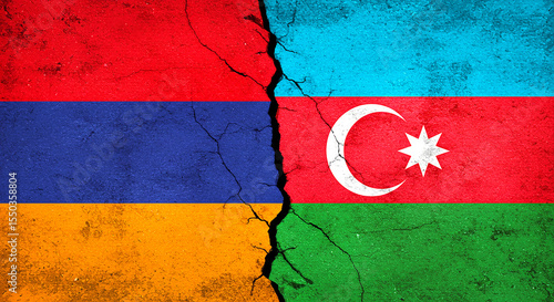 Flags of armenia and azerbaijan split by a crack on a textured background symbolizing conflict tension