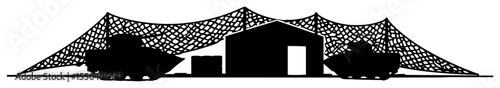 military base with camouflage netting and armored vehicles