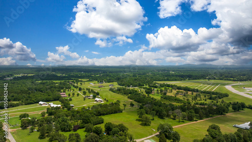 aerial shot of vast miles of lush green trees and homes at the Nashville Superspeedway in Lebanon Tennessee USA
