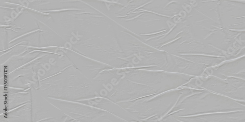 Close up of wrinkled and creased light gray surface creating an abstract textured background.