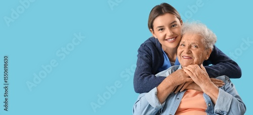 Nurse hugging senior woman ...