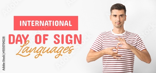 Young deaf mute man on ligh...