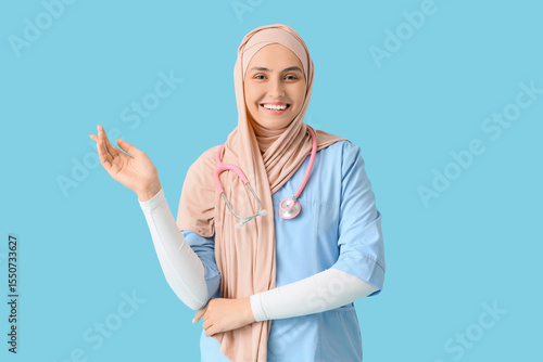Female Muslim doctor in hij...