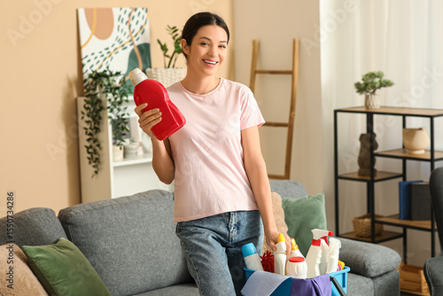 Young woman and bucket with...