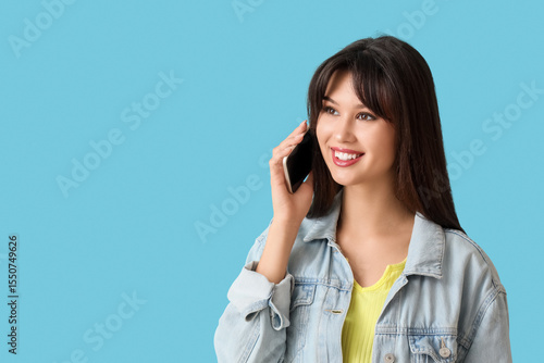 Smiling young woman talking...