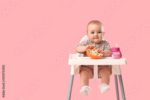 Cute little baby with snack...