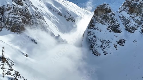 Wallpaper Mural Breathtaking drone view of snow-covered mountain peaks and valleys during winter day Torontodigital.ca
