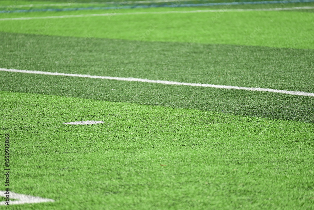 Obraz premium artificial green grass background for playground