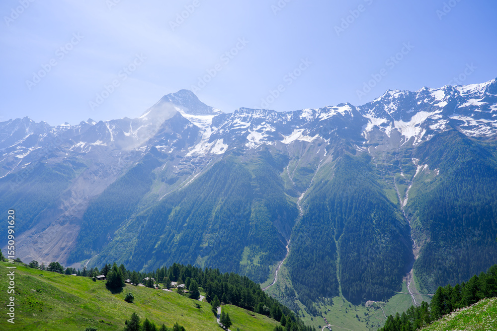 Obraz premium Beautiful view with scenic landscape in the Swiss Alps at Lötschental Valley at Lauchernalp on a sunny late spring day. Photo taken June 19th, 2025, Wiler, Switzerland.