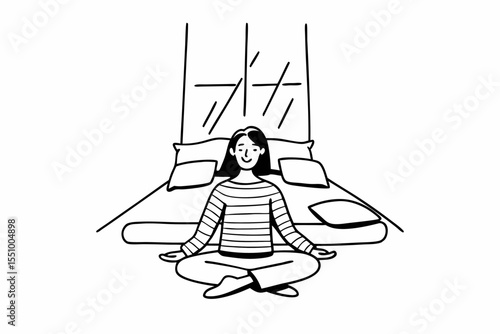 A woman sits cross legged on the floor of a cozy, sunlight filled bedroom at home, meditating in a yoga pose. She is calm and relaxed, wearing a striped yellow sweater