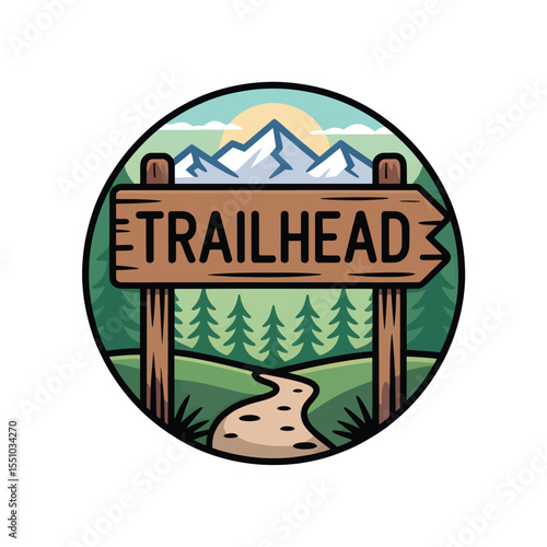 A Rustic Brown Wooden Trailhead Sign Against a Scenic Background of Green Pine Trees Winding Path and Snowy Mountains Under a Sunny Sky