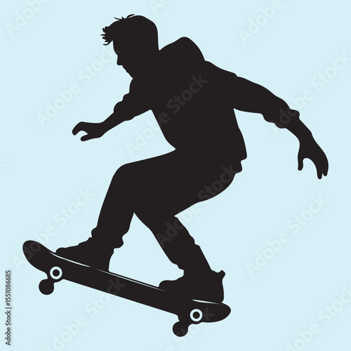 silhouette of a skateboarder jumping