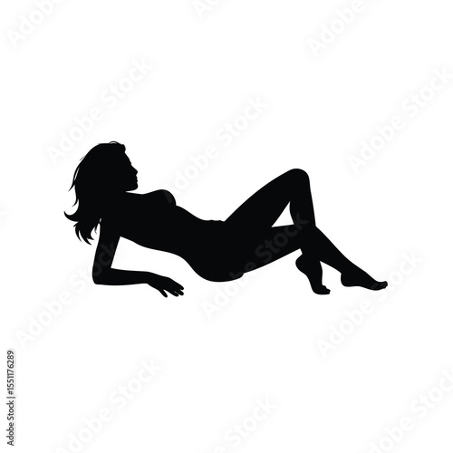 Elegant silhouette of a reclining woman lying down and relaxed pose
