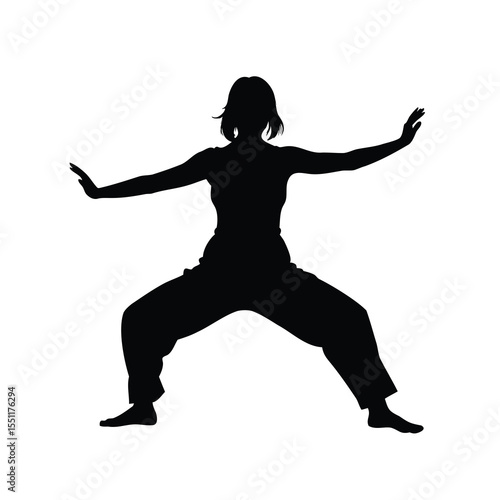 Silhouette of a person practicing Tai Chi or martial arts stance isolated
