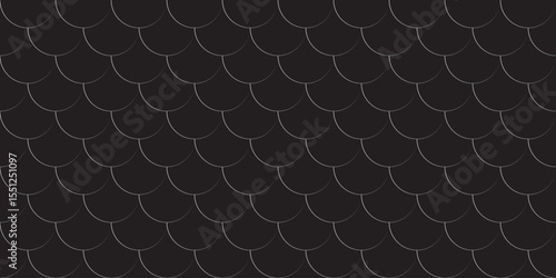 Abstract background in the form of silver fish scales on a black background.