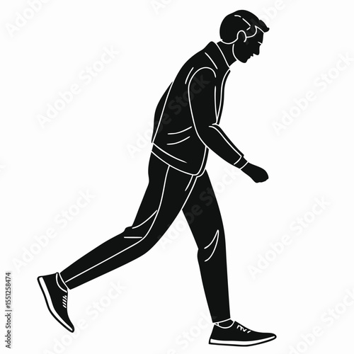 Silhouette of a man walking in a casual stride