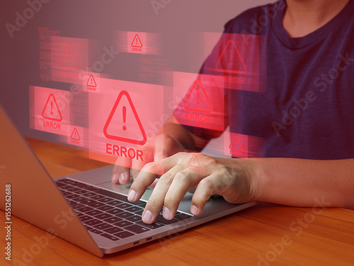 Person typing on laptop with multiple red error warning signs floating above keyboard, indicating computer malfunction or software issue causing frustration and urgency