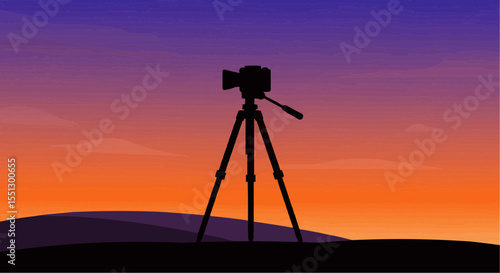 Camera on tripod at sunset.