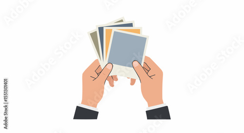 Hands holding a stack of photos.