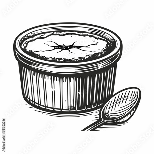 Delicious crème brûlée with caramelized sugar crust in ramekin, accompanied by spoon. Crème brûlée is decadent custard dessert, torched to perfection, offering satisfying crack when broken.