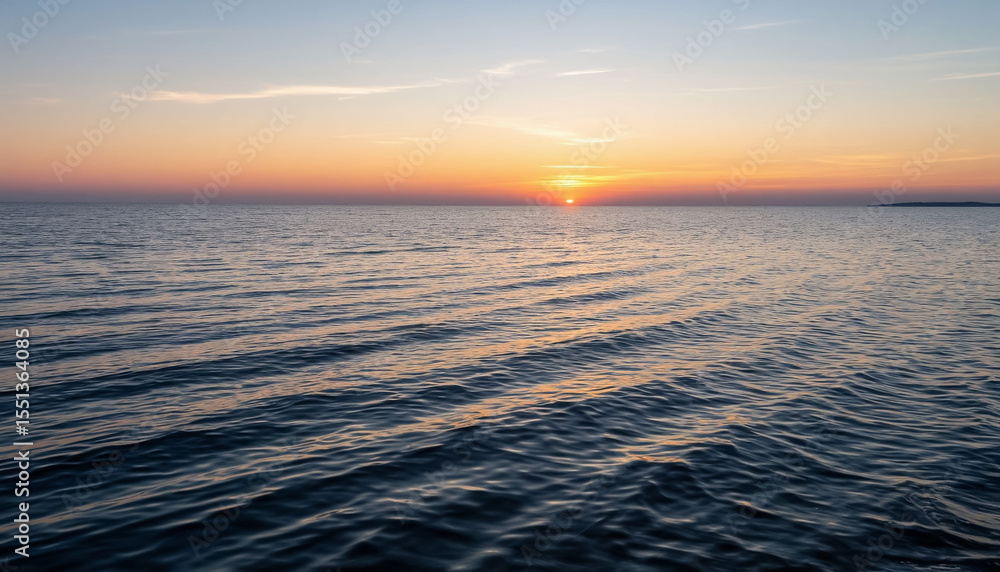 Obraz premium Dawn on the water of a huge lake.