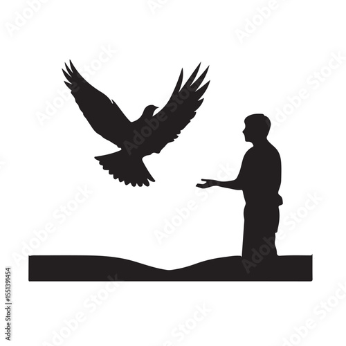 Person releasing dove silhouette