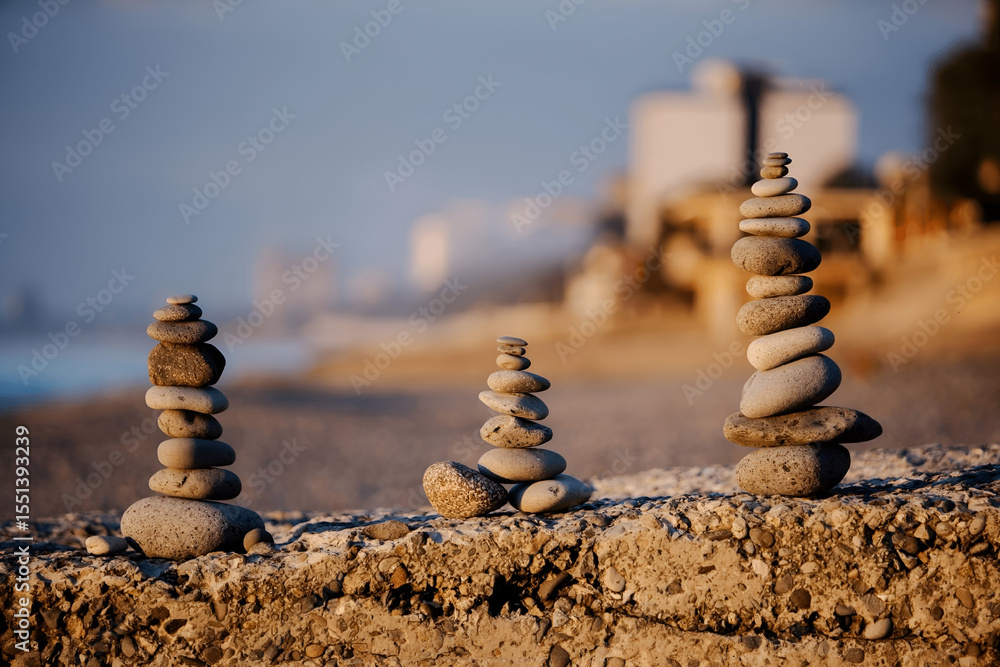 Obraz premium stack of stones on beach
