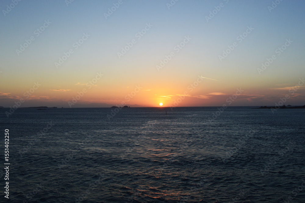 Fototapeta premium Sunset over the sea in Santorini island Greece