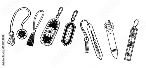 Collection of decorative bookmarks with floral designs and tassel accents illustrating stationery and reading themes in black and white.