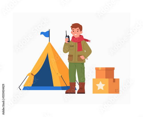 A man in outdoor attire stands next to a tent and boxes holding a walkietalkie