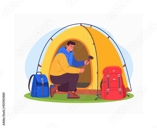 A person hammers a stake into the ground next to a yellow tent with a red backpack and blue backpack nearby