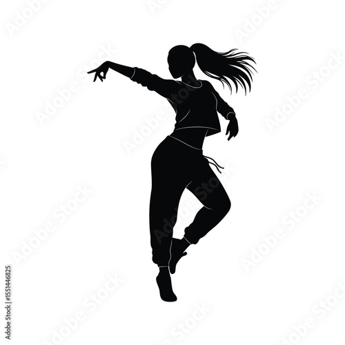 Silhouette of a female dancer in stylish sportswear dynamic pose hip hop street dance modern dance