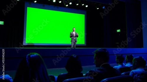 Keynote Speaker on Stage with Green Screen Presentation Conference Event