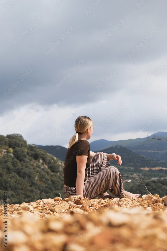 Naklejka premium Mindful Woman Embracing Nature, Mountain Retreat, Digital Detox, Spiritual Awakening, Gen Z Wellness, Mental Balance, Eco Travel, Outdoor Meditation