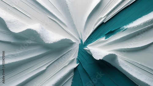 Abstract close up of textured white paint strokes against a teal background