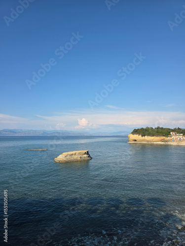 The iconic rock formations of Canal d'Amour in Sidari, Corfu, on a beautiful summer afternoon.