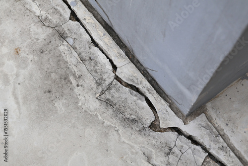An earthquake significant crack to develop in the cement floor.