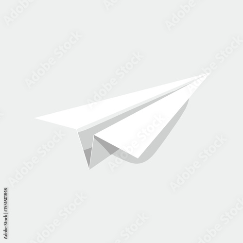Crisp white paper airplane with folded wings casting a soft shadow.