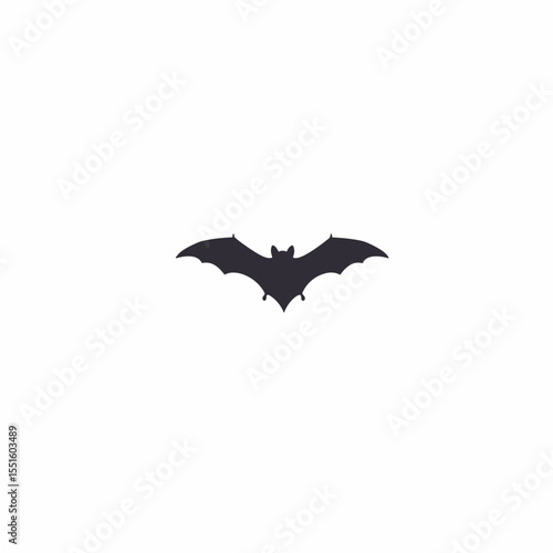 Silhouette of a Bat with Spread Wings and Pointed Ears.