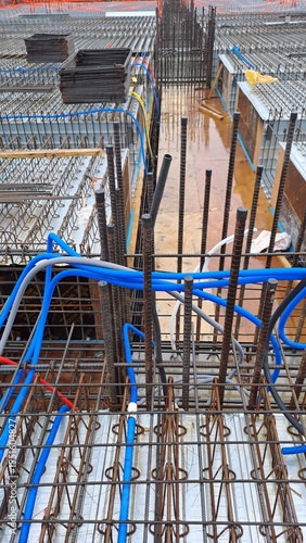 MEP Embedded Conduit Installation in Reinforced Concrete Slab at Construction Site