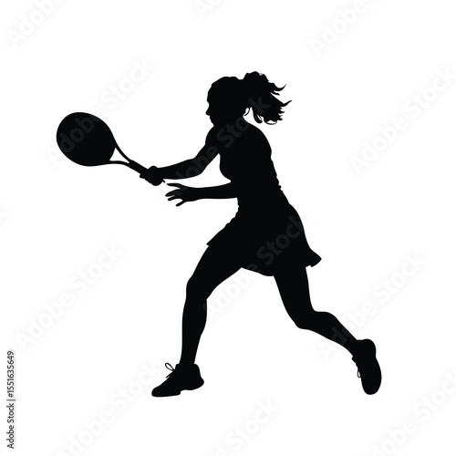 Silhouette of a determined female tennis player ready to strike the ball